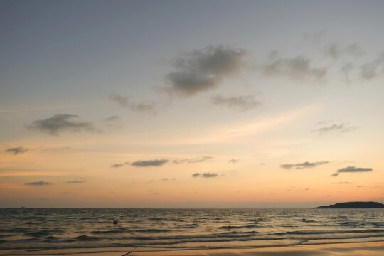 Sunset beautiful golden yellow. Beach, sea, sandy beach. On twilight.