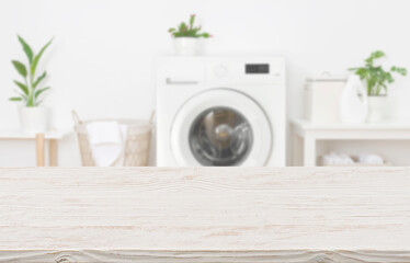 Mockup for design of empty wooden table in laundry room