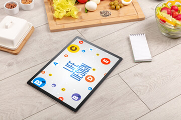Healthy Tablet Pc compostion with LIFE DESIGN inscription, weight loss concept