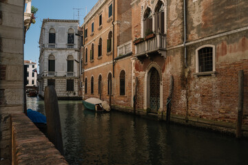 Boats on the canal of Venice, Italy.