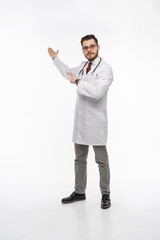 A portrait of a medical doctor posing against white background