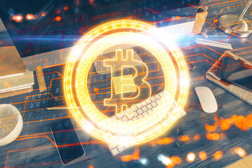 Double exposure of blockchain and crypto economy theme hologram and table with computer background....