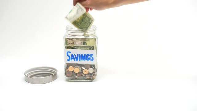 442 taking money out of a money-saving jar