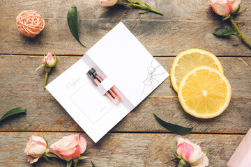 Perfume sample on wooden background