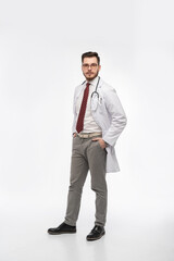 A portrait of a medical doctor posing against white background