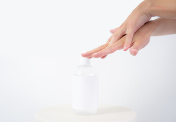 Hand of lady cleaning hands with alcohol gel or anti bacteria soap to stop germ, bacteria, virus. Covid19 coronavirus prevention