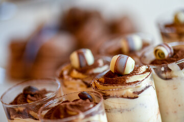 Close up of a glass with tiramisu, selective focus