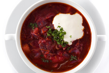 Traditional Ukrainian Russian borsch. Beetroot soup isolated on white background. Top view