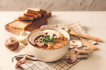 Tasty beef stroganoff in bowl on table