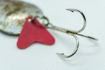 Fishing lure on a predator spinner close-up. Macro photography
