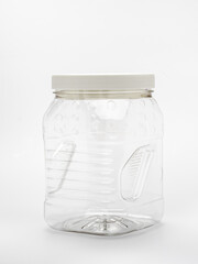 transparent plastic container with a white lid