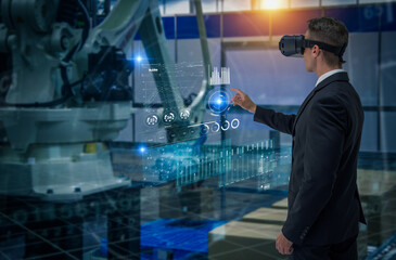 Industry 4.0 Robot concept .Engineers are using virtual AR to maintain and check the work of human...