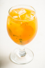 Orange cocktail on rustic background. Selective focus. Shallow depth of field. 