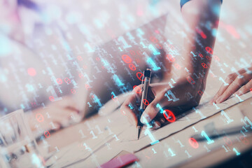Double exposure of woman's writing hand on background with data technology hud. Big data concept.