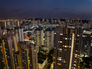 Fototapeta na wymiar High rise apartments at night