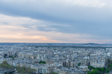 Panorama of Paris in the evening from the height of bird flight at sunset