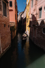 Gondoliers on the Canal of Cannaregio district of Venice, Italy.