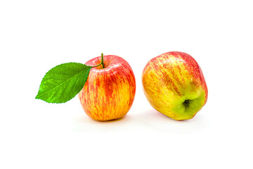 Red yellow apple with green leaf and slice isolated on white background