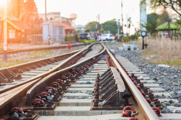 Railroad tracks in the countryside when the sun is about to fall