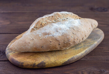 Homemade grain healthy bread.Bread made from gray flour with the addition of cereals.Healthy food.