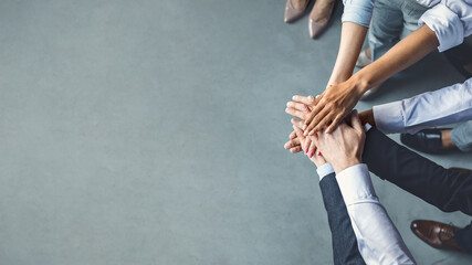 Unrecognizable Colleagues Holding Hands Standing Together In Office, Top View