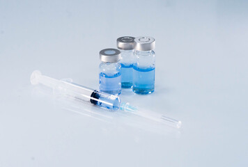 close up vaccine and syringe injection for prevention from  virus infection