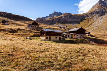 Traditional cottage mountain houses in Alps Mountains. Rural rustic architecture, France, Europe.