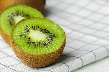 Cut kiwi half slice close up photo