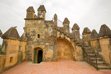 View of the walls of the Alcázar de los Reyes Cristianos in Cordoba, Spain.