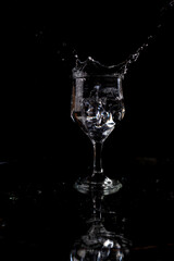 A splash with water and ice on a black background