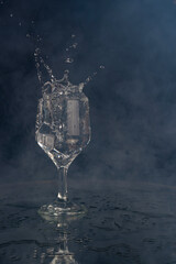 A splash with water and ice on a black background