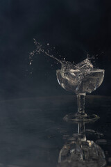 A splash with water and ice on a black background