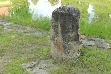 stone cross in the park