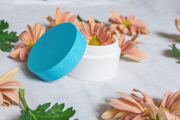 The concept of skin care and beauty. Close up of cream box.