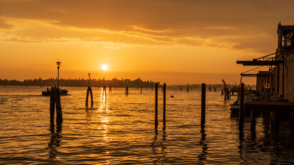Fototapeta na wymiar sunrise on the pier in Venice