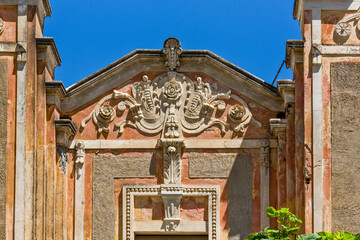 pediment of a ruined shipowner's building facade in Olhao, Algarve