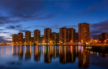 Naklejka premium The new urban area of ​​St. Petersburg on the Southern Highway near the ponds and park.