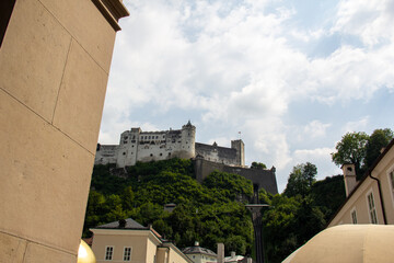 Fototapeta na wymiar The castle Hohensalzburg on the cliff in the town of Salzburg, Austria, seen from below