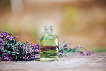 Obraz na płótnie Canvas bottle of lavender oil