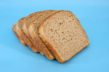 slice of rye bread Isolated on a blue background.