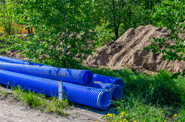 Fototapeta premium Blue corrugated polypropylene pipes