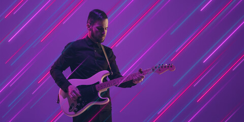 Musician with guitar impovising. Creative portrait with copyspace. Neon lighted, colored portrait with neon, flyer, proposal. Motion, action, youth culture concept. Contemporary art, modern design.