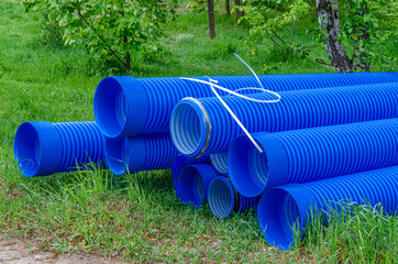 Fototapeta premium Blue corrugated polypropylene pipes