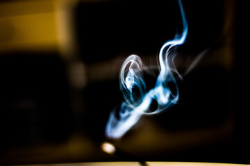 blue smoke on black background