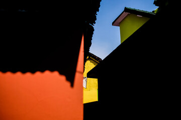 Shadow of a colored house