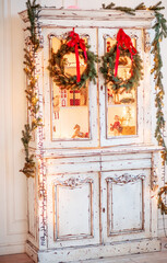 Fototapeta na wymiar Advent Christmas wreath on wooden door decoration