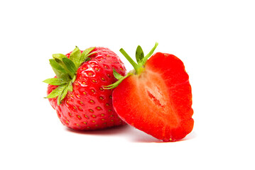 Whole and slice of ripe delicious sweet strawberries on a white background