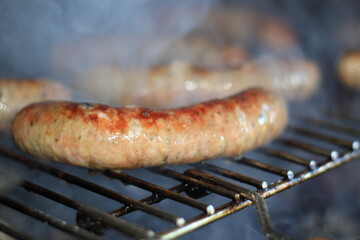 shrouded in smoke sausage roasted on the grill