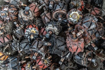 scrap yard of alternator rotor rotates inside stator for recycling