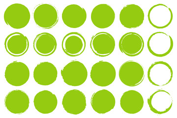 Set of green grunge circles shapes on a white background